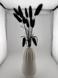 Vase with dried flowers